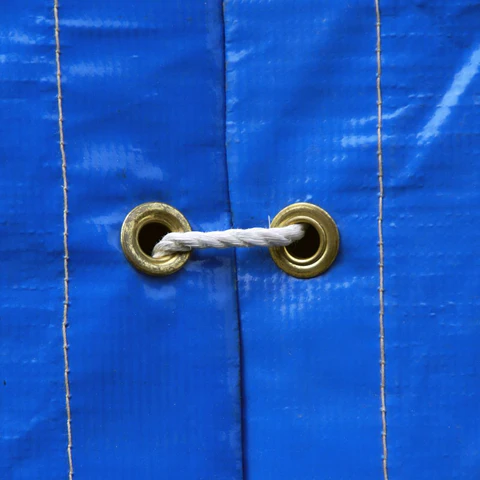 Understanding Metal Grommets and Tie-Downs: How to Keep Your Tarp Secure in Any Condition